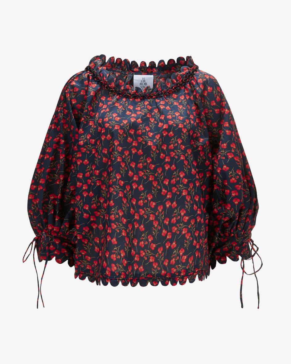 Imani Bluse für Damen von Horror Vacui in Rot und Nachtblau. Das weite Modellaus angenehmer Baumwolle präsentiert sich dank des floralen.... Mehr Details bei Lodenfrey.com!